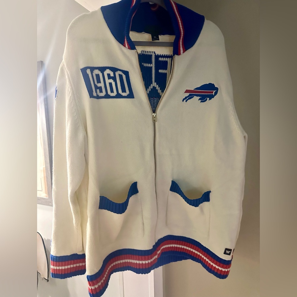Buffalo Bills Men’s The Wild Collective Cream
Jacquard Full-Zip Sweater